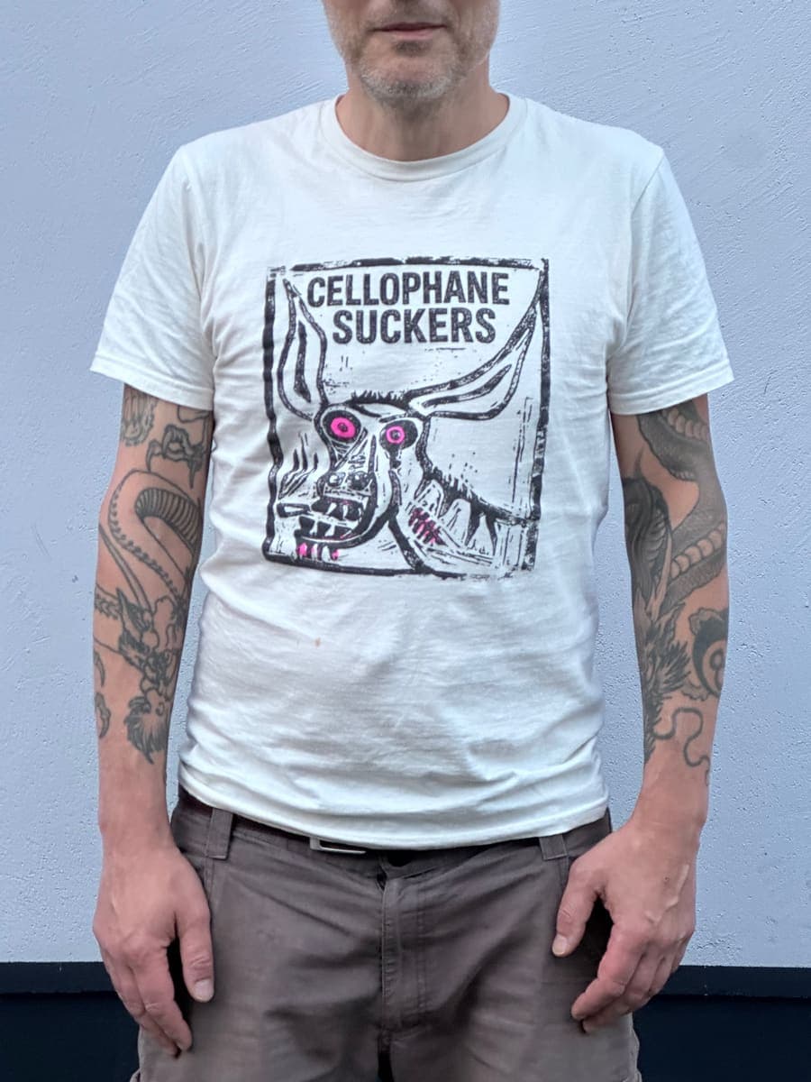 Natural white t-shirt with a black and pink woodcut donkey head